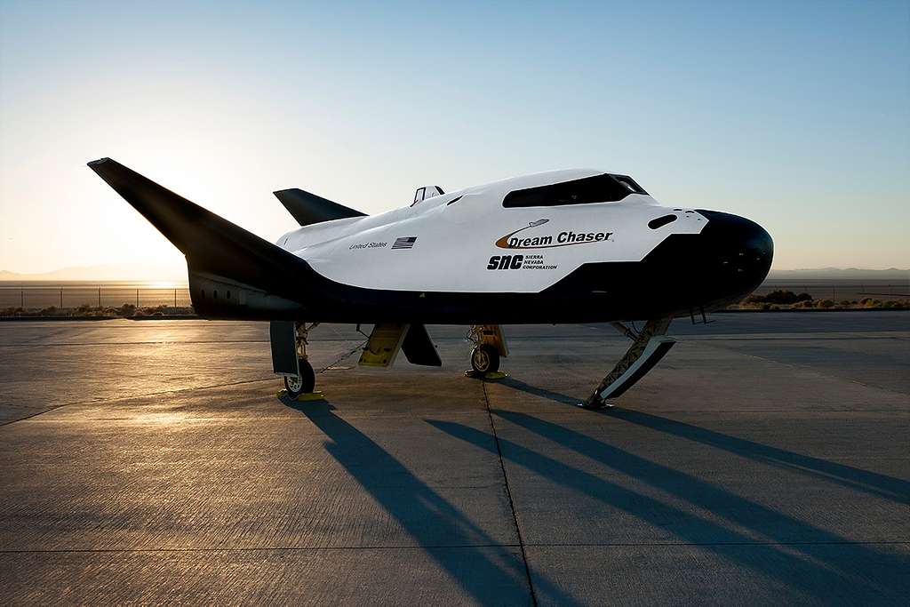 The similarity between the Dream Chaser spacecraft and NASA's Space Shuttle, which was retired in 2011, allows it to return to Earth and land on a runway in a similar manner to an airplane.  Credit: NASA